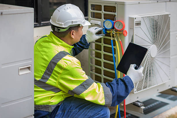 Professional Hvac technician working in Harvey, MI